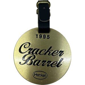1995 Vintage Cracker Barrel Henkel Round Gold Black Souvenir Golf Luggage Tag 4"